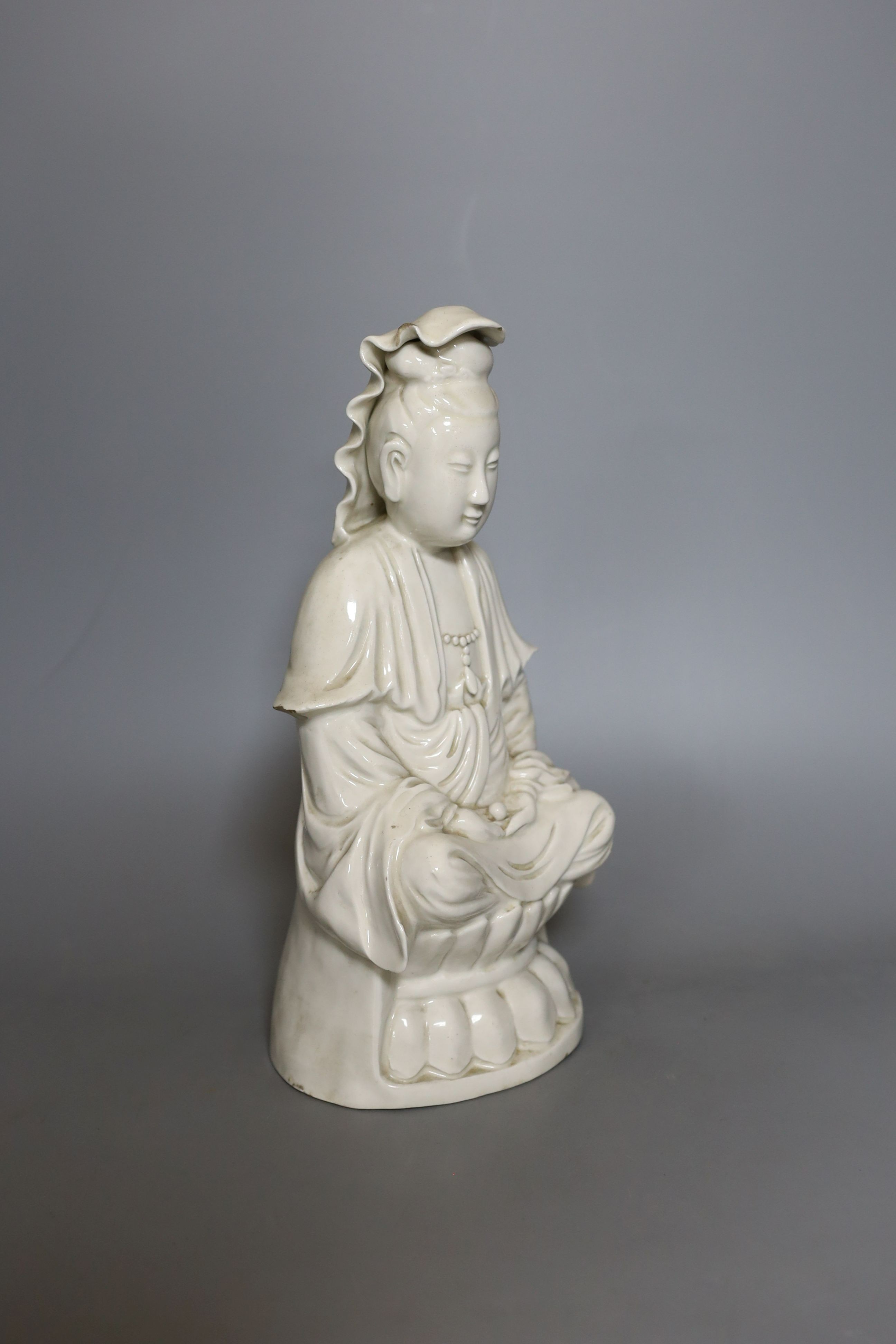 A Chinese blanc de chine figure of Guanyin- 29cm tall